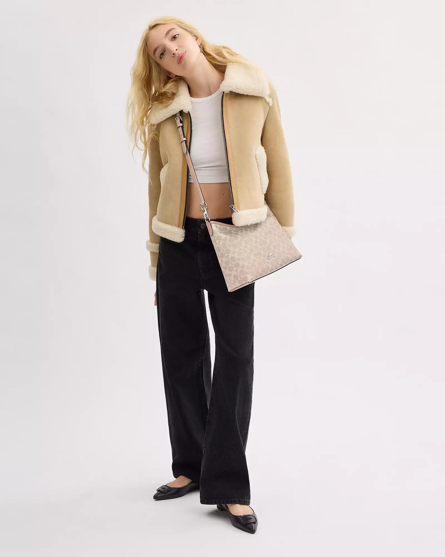 Laurel Shoulder Bag
In Signature