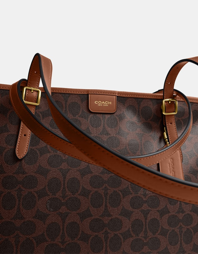 Coach
Signature Coated Canvas Taxi Tote Bag