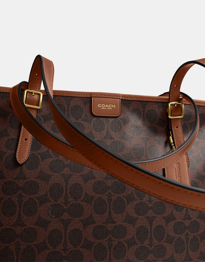 Coach
Signature Coated Canvas Taxi Tote Bag