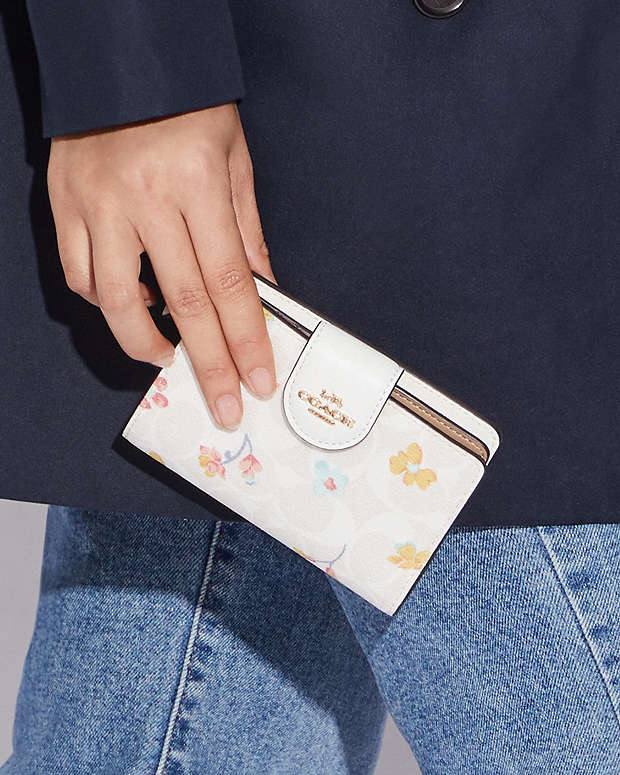 Medium Corner Zip Wallet In Signature Canvas With Mystical Floral Print