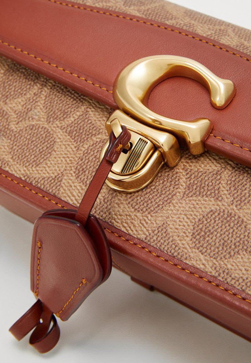Coach studio canvas