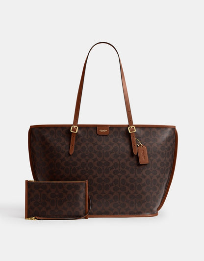 Coach
Signature Coated Canvas Taxi Tote Bag