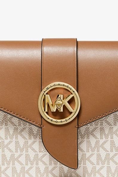 Michael Kors
Signature Mk Charm Mid Wallet On Chain Crossbody