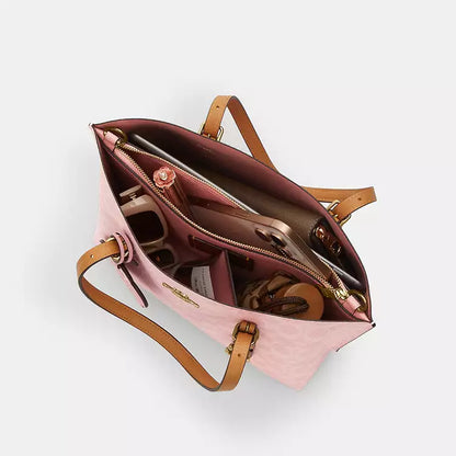 Mollie Tote Bag 25
In Signature Canvas