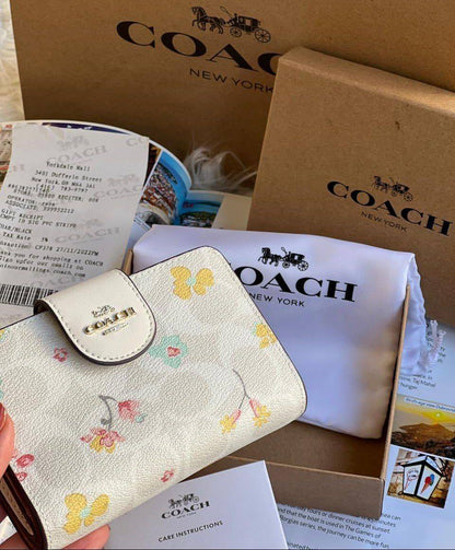 Medium Corner Zip Wallet In Signature Canvas With Mystical Floral Print