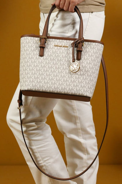 Michael kors 

Jet Set Travel Extra-Small Logo Top-Zip Tote Bag