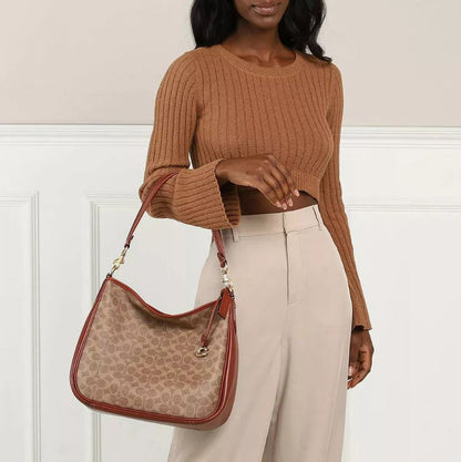 Coach Cary Shoulder Bag with Signature Canvas and Mixed