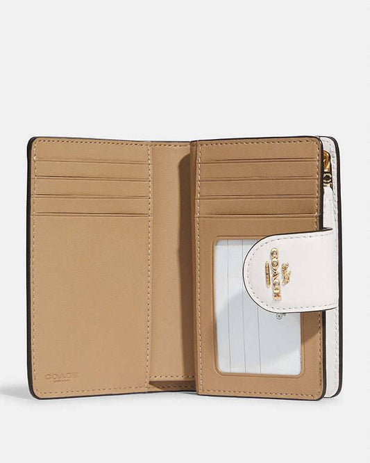 Medium Corner Zip Wallet In Signature Canvas With Mystical Floral Print