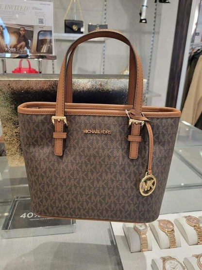 Michael kors 

Jet Set Travel Extra-Small Logo Top-Zip Tote